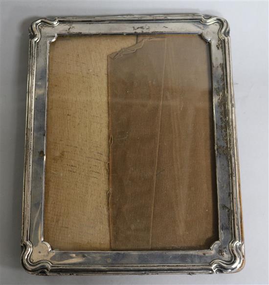 A George V silver rectangular photograph frame, James Deakin & Sons, Sheffield, 1921, 24.5cm.